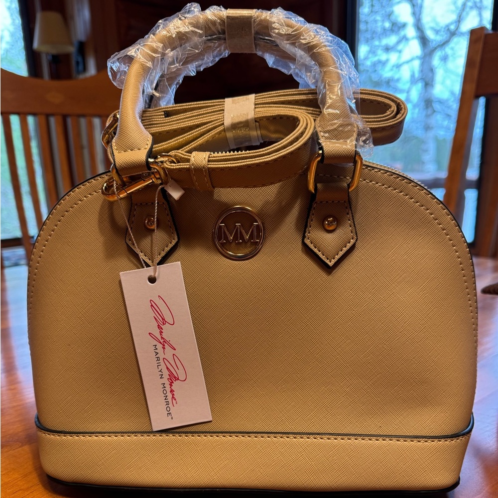 NWT MARILYN MONROE BRAND HANDBAG WITH HANDLES AND SHOULDER STRAP.
